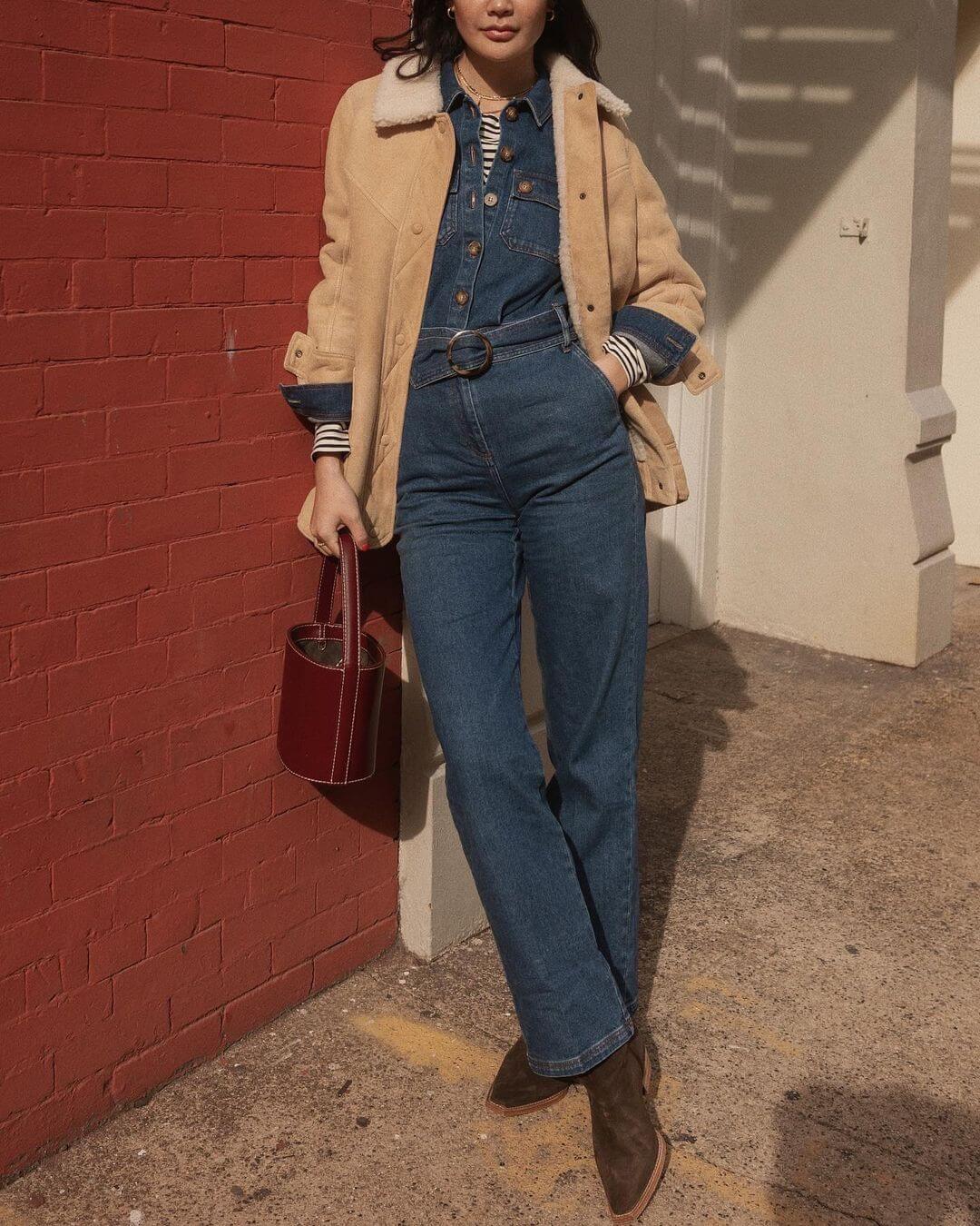 The Right Way To Wear A Denim Jumpsuit This Winter