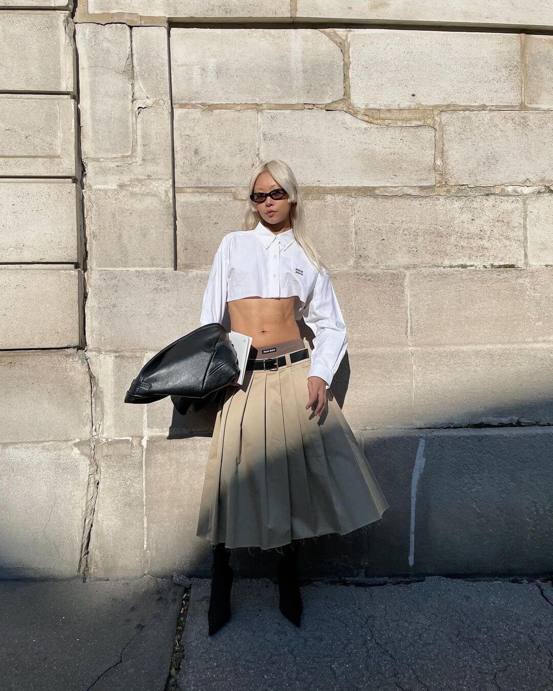 The Cool Girl Way To Wear A Pleated Skirt
