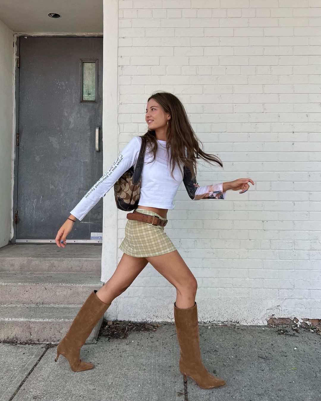 Here's A Stylish Way To Wear Knee-High Boots For Summer
