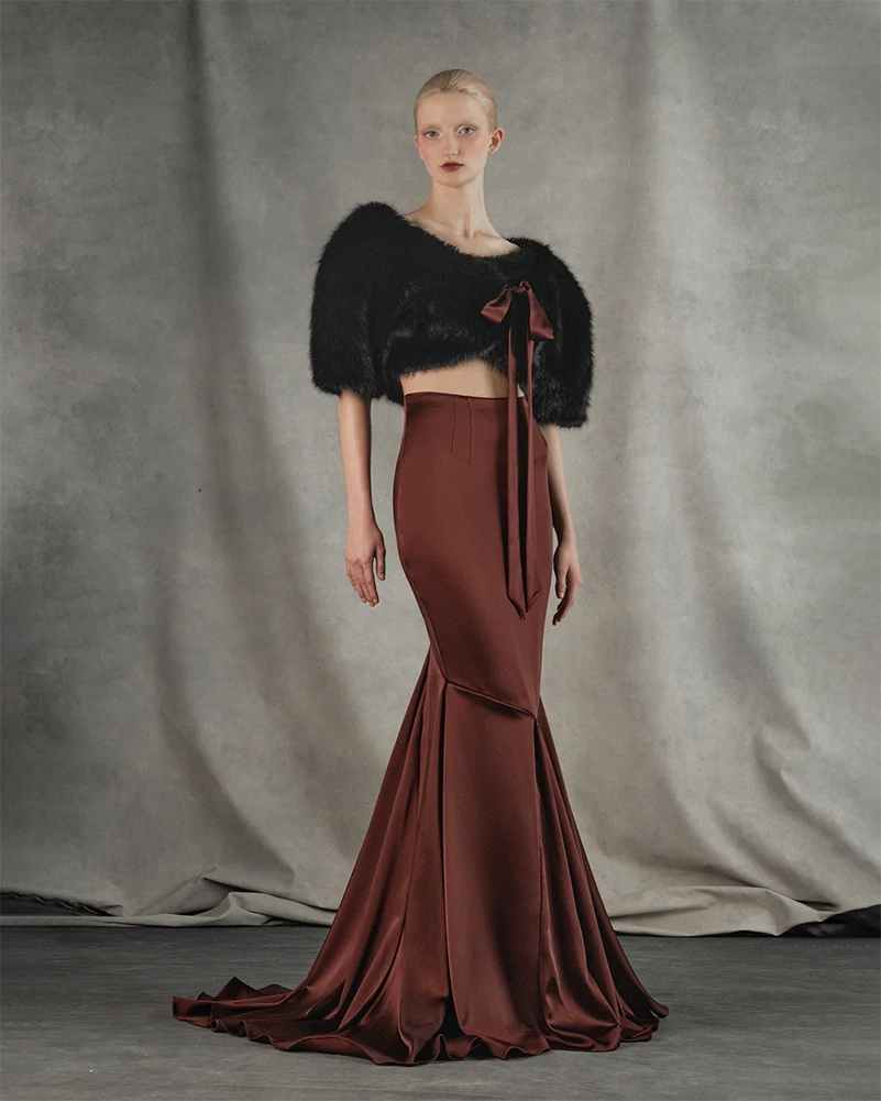 Rasario Pushes Statement Dressing Forward