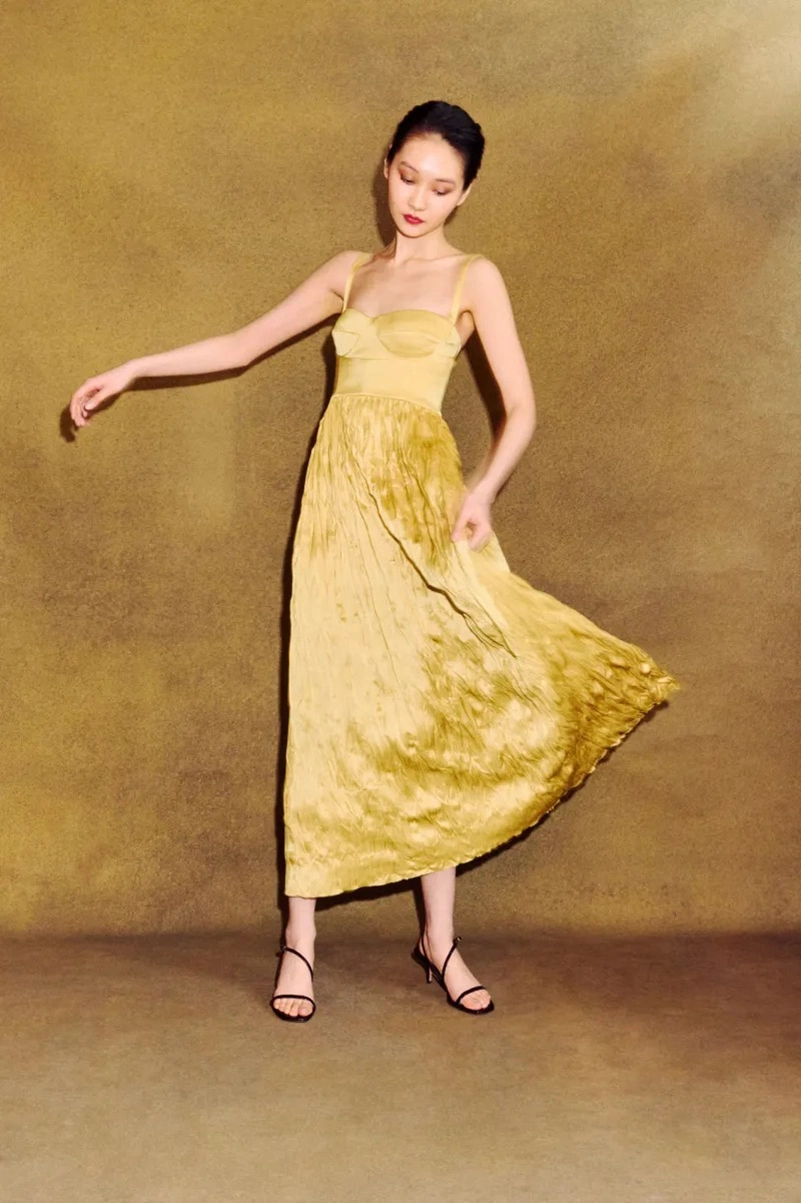 Alejandra Alonso Rojas Fall 2026 Reworks Existing Fabrics Into Gold And Bordeaux Satin Alejandra Alonso Rojas Fall 2026 Reworks Existing Fabrics Into Gold And Bordeaux Satin