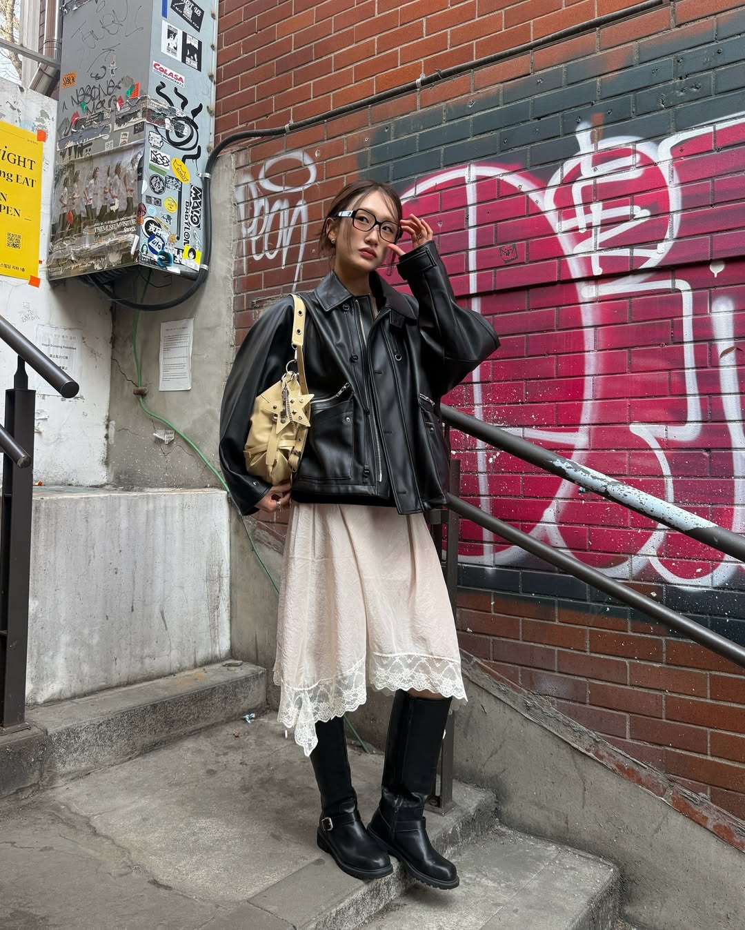 fashion blogger wearing a slip dress for a chic spring transition outfit