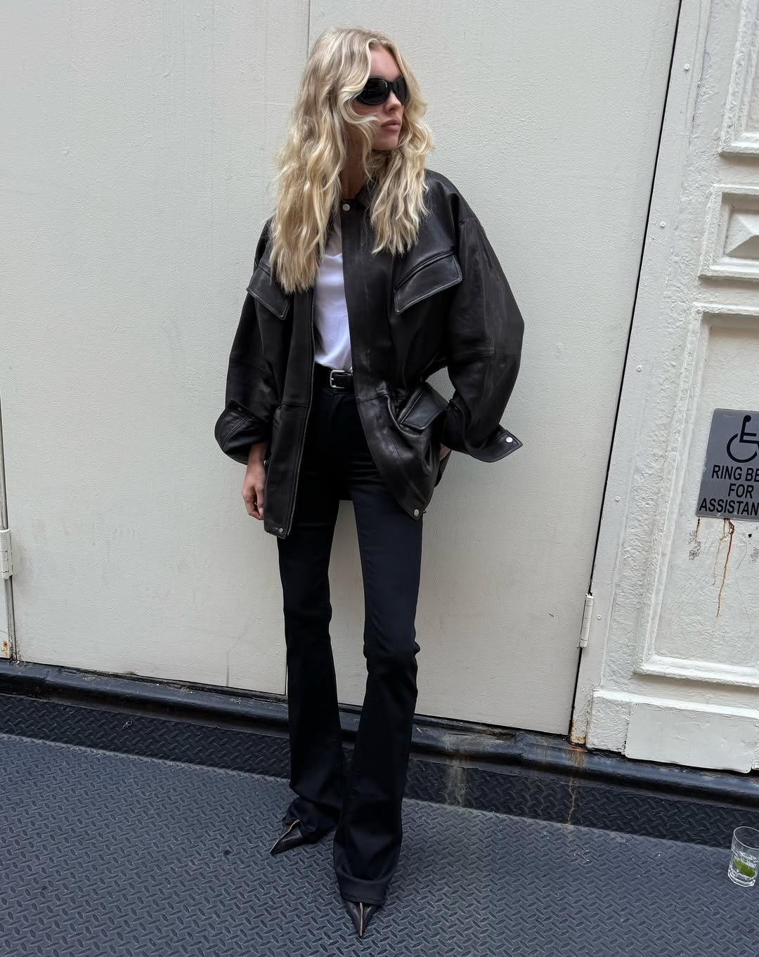 Elsa Hosk Wearing A Black Flared Jeans Outfit