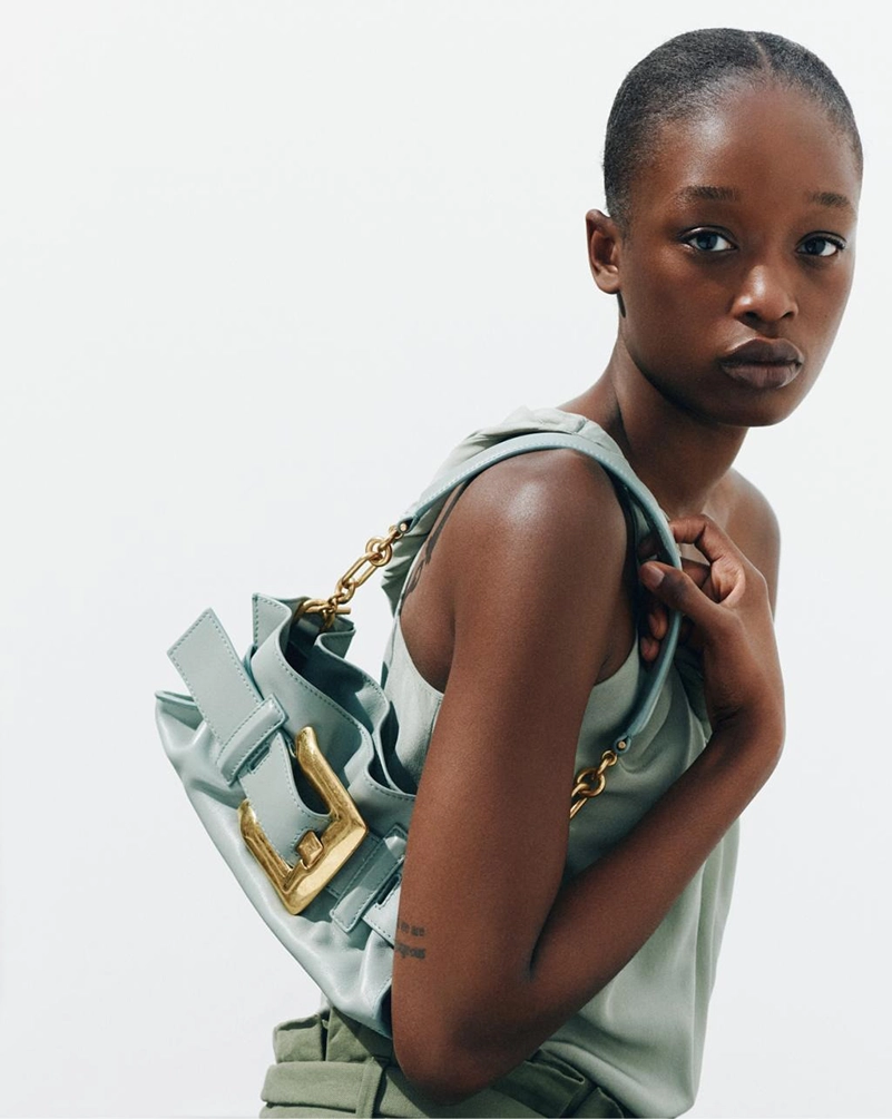 Balmain Spring Summer 2026 Campaign Centers Sand Tones And Satin Draping
