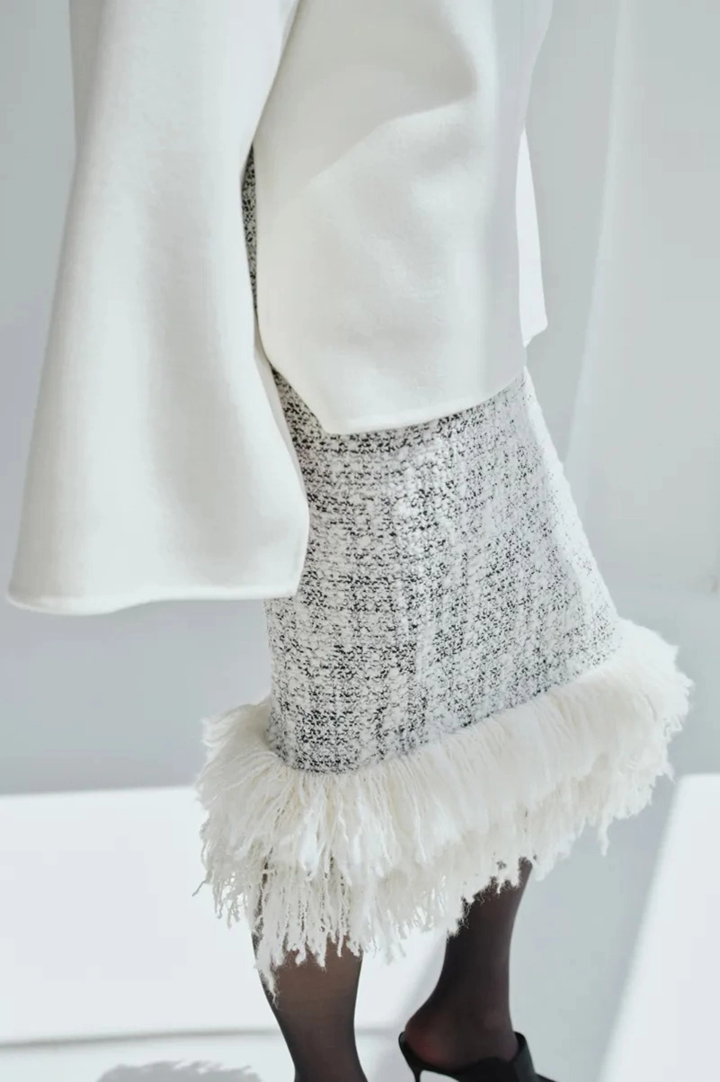 Adam Lippes Resort 2027 Puts Lace, Puffers, And Cashmere In Focus