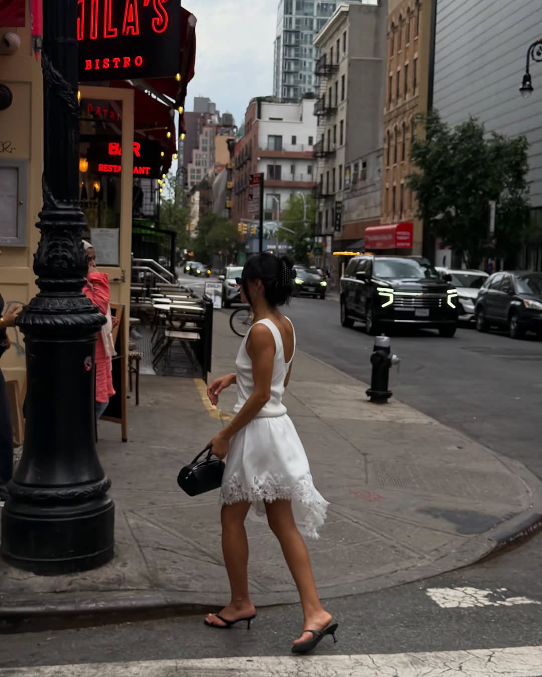 Fashion Blogger Wearing An Asymmetrical Skirt For Summer