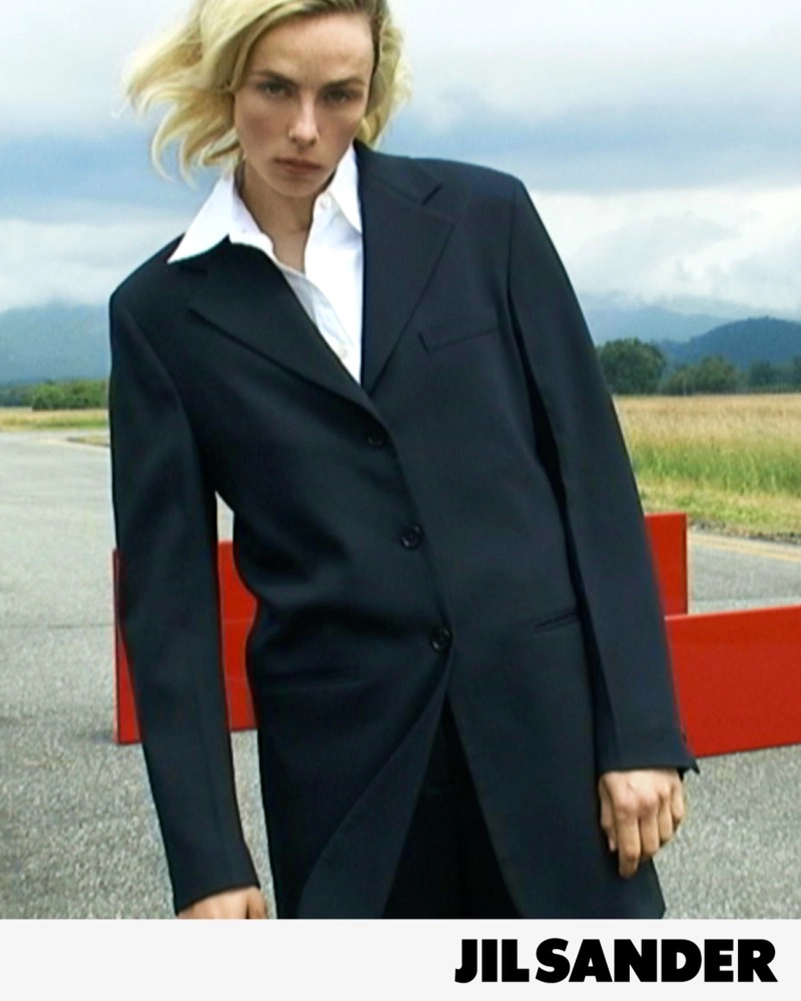 Jil Sander Fall 2026 Turns An Airfield Into A Very Strange Living Room