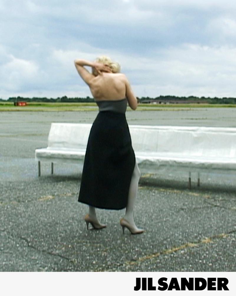 Jil Sander Fall 2026 Turns An Airfield Into A Very Strange Living Room