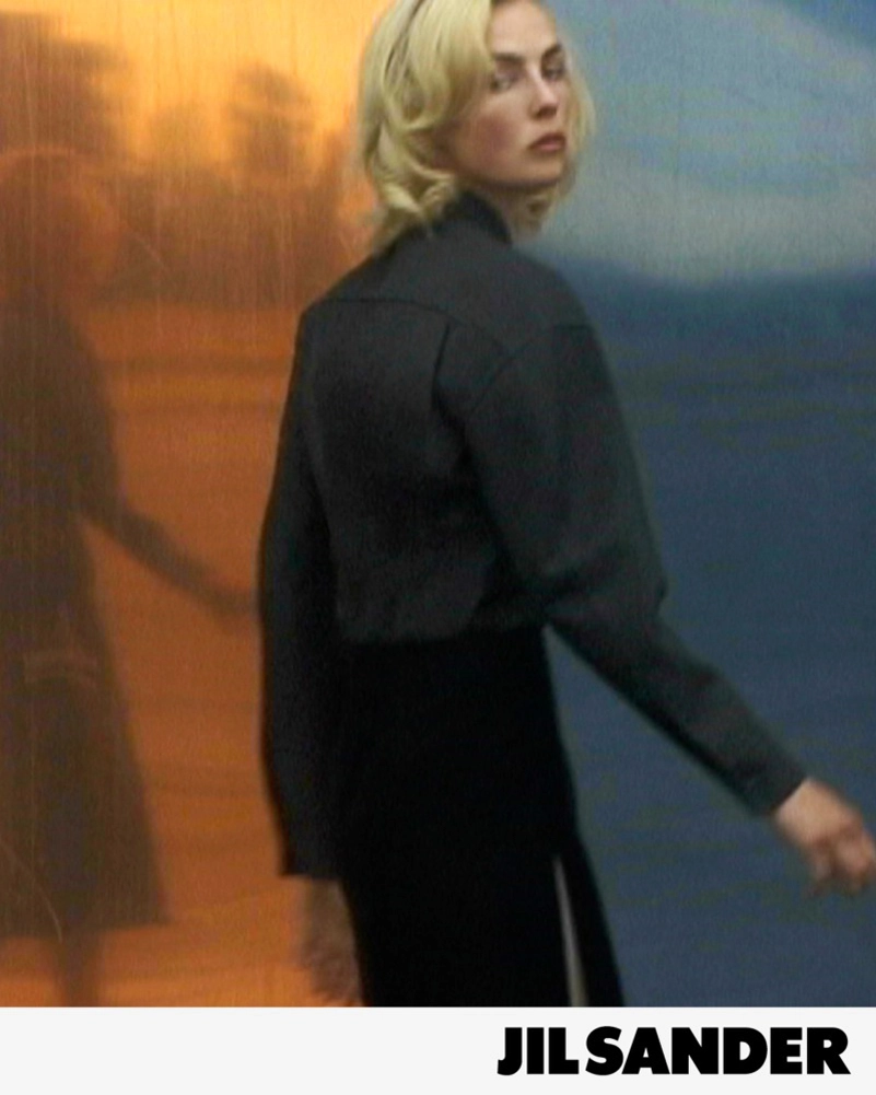 Jil Sander Fall 2026 Turns An Airfield Into A Very Strange Living Room