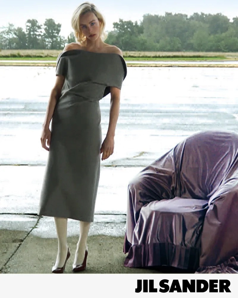 Jil Sander Fall 2026 Turns An Airfield Into A Very Strange Living Room