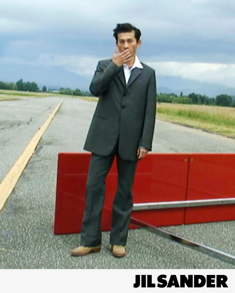 Jil Sander Fall 2026 Turns An Airfield Into A Very Strange Living Room