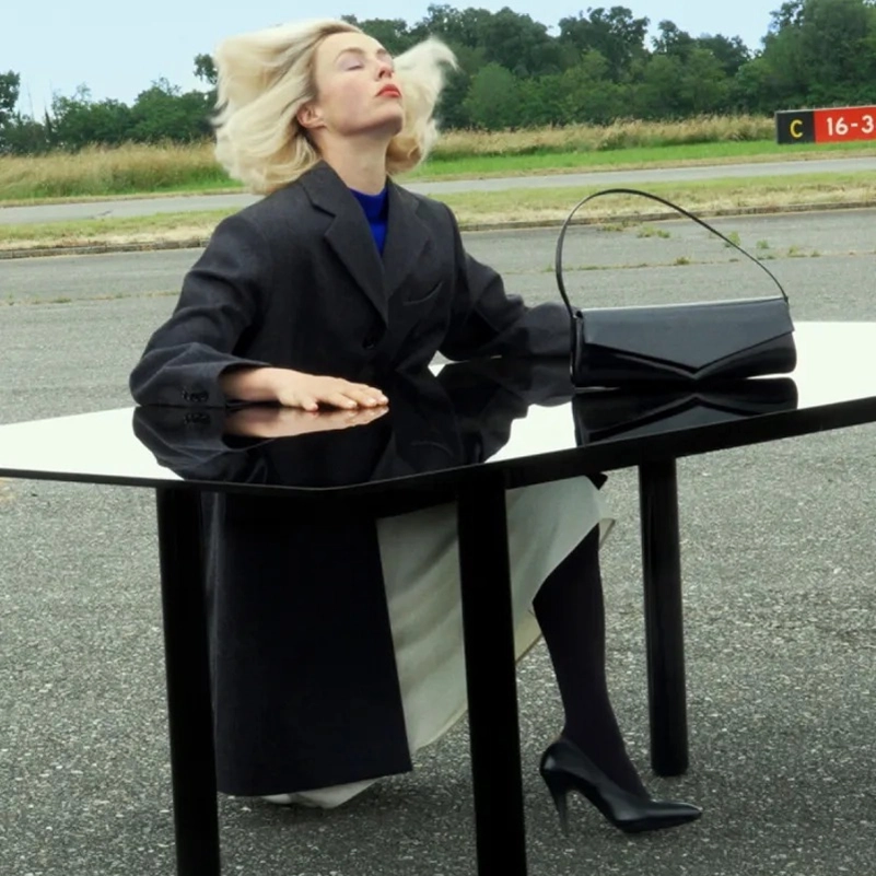 Jil Sander Fall 2026 Turns An Airfield Into A Very Strange Living Room