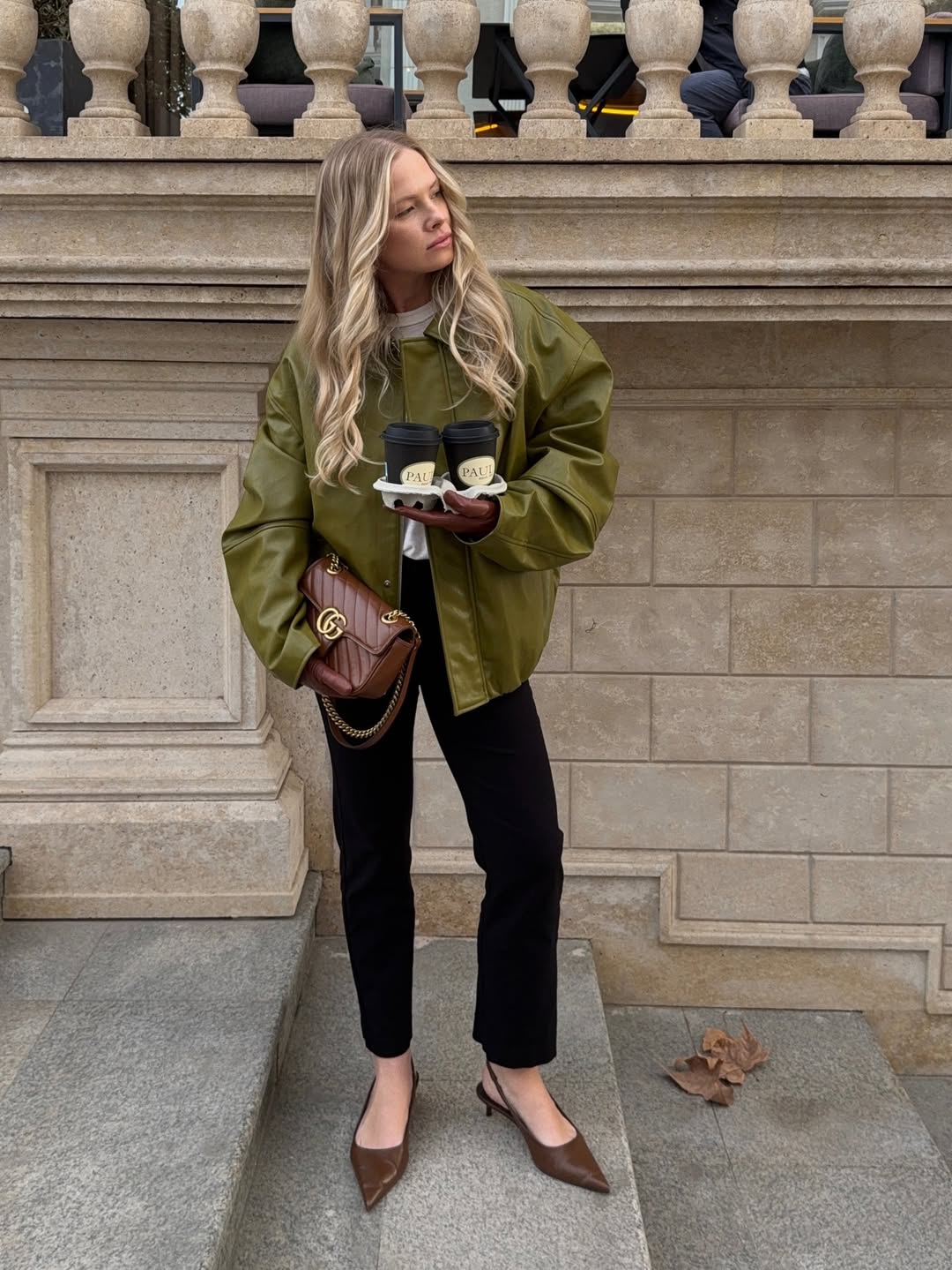 Fashion Blogger Wearing A Green Leather Bomber Jacket