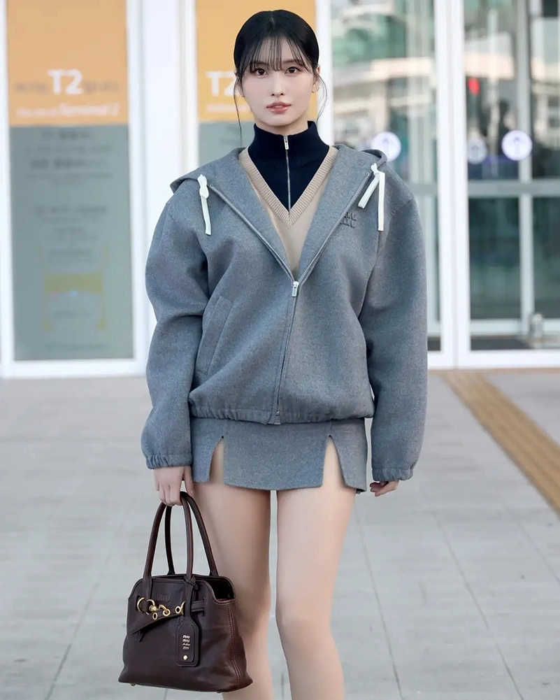 Momo Heads To Miu Miu’s Spring 2027 Show In A Gray Mini And Hoodie #Getthelook