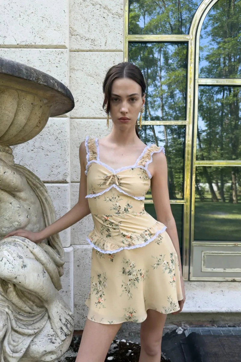 Alessandra Rich Spring 2027 Mixes Garden Party Dressing With Boudoir Glamour